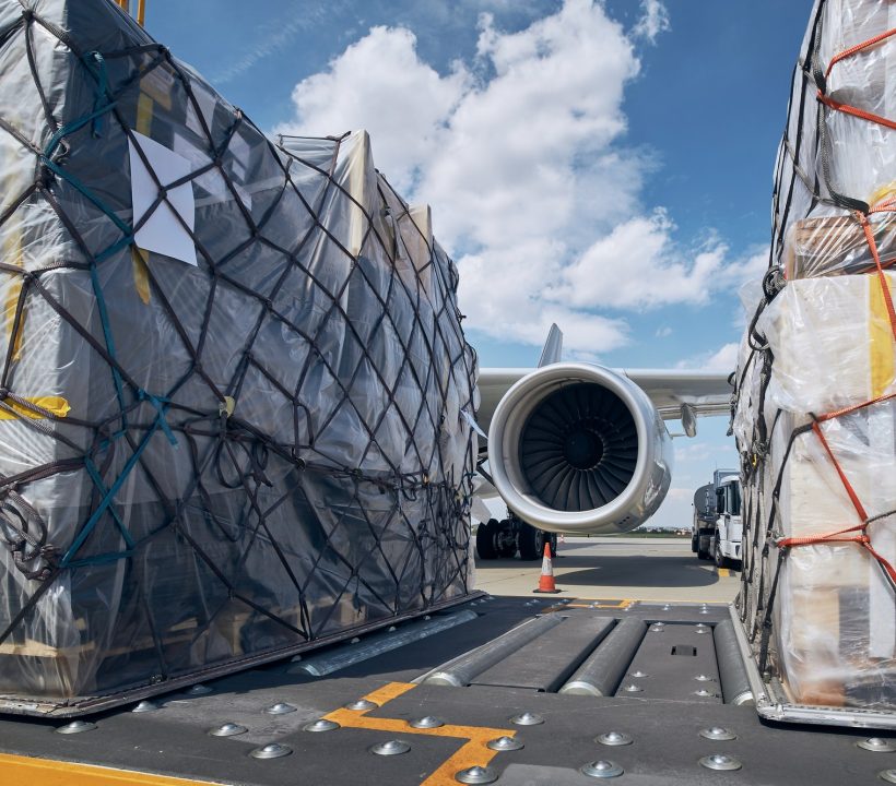 loading-of-cargo-containers-to-airplane.jpg